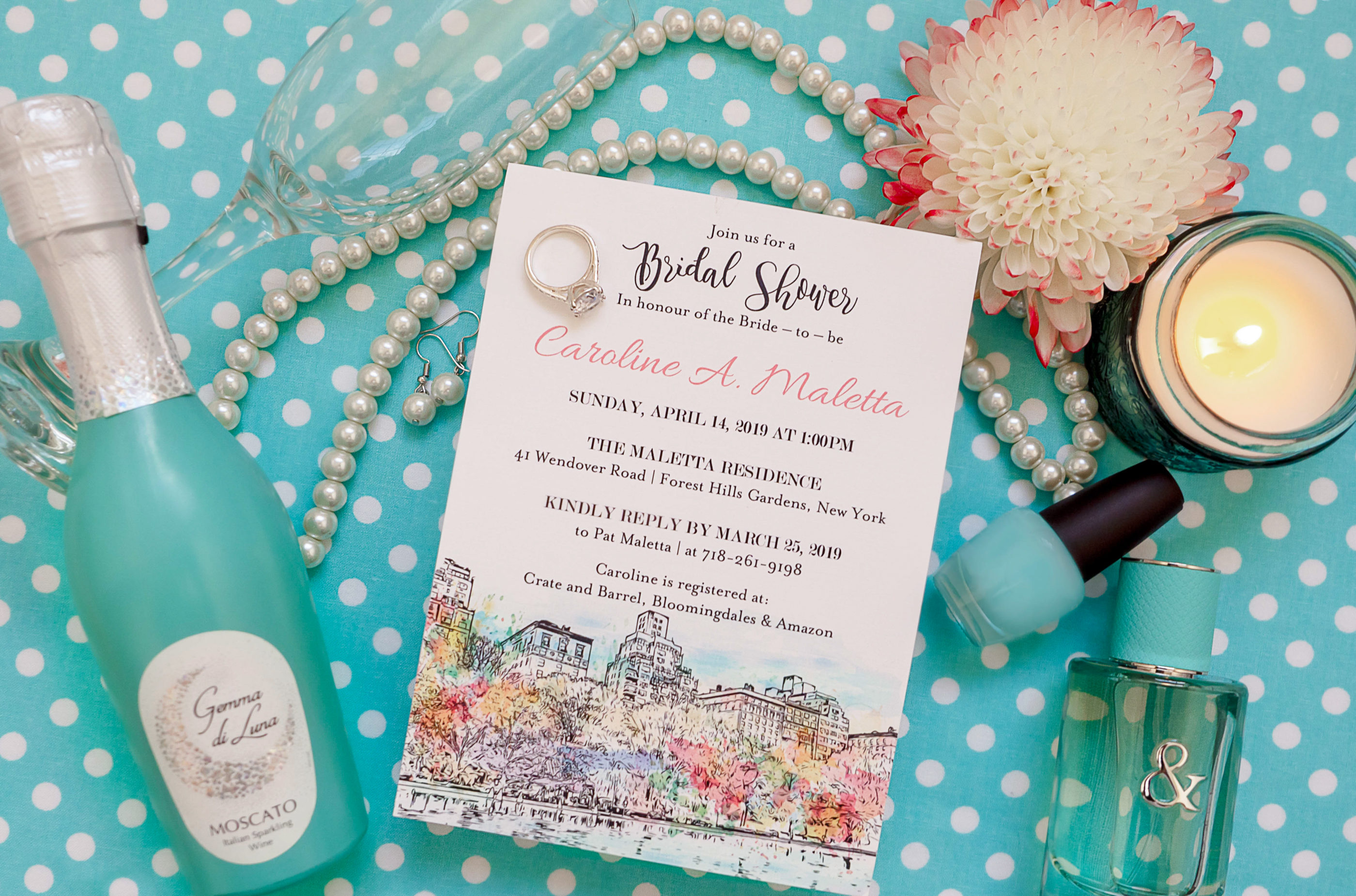 watercolor bridal shower invitation with bottle of moscato and tiffany & co. perfume