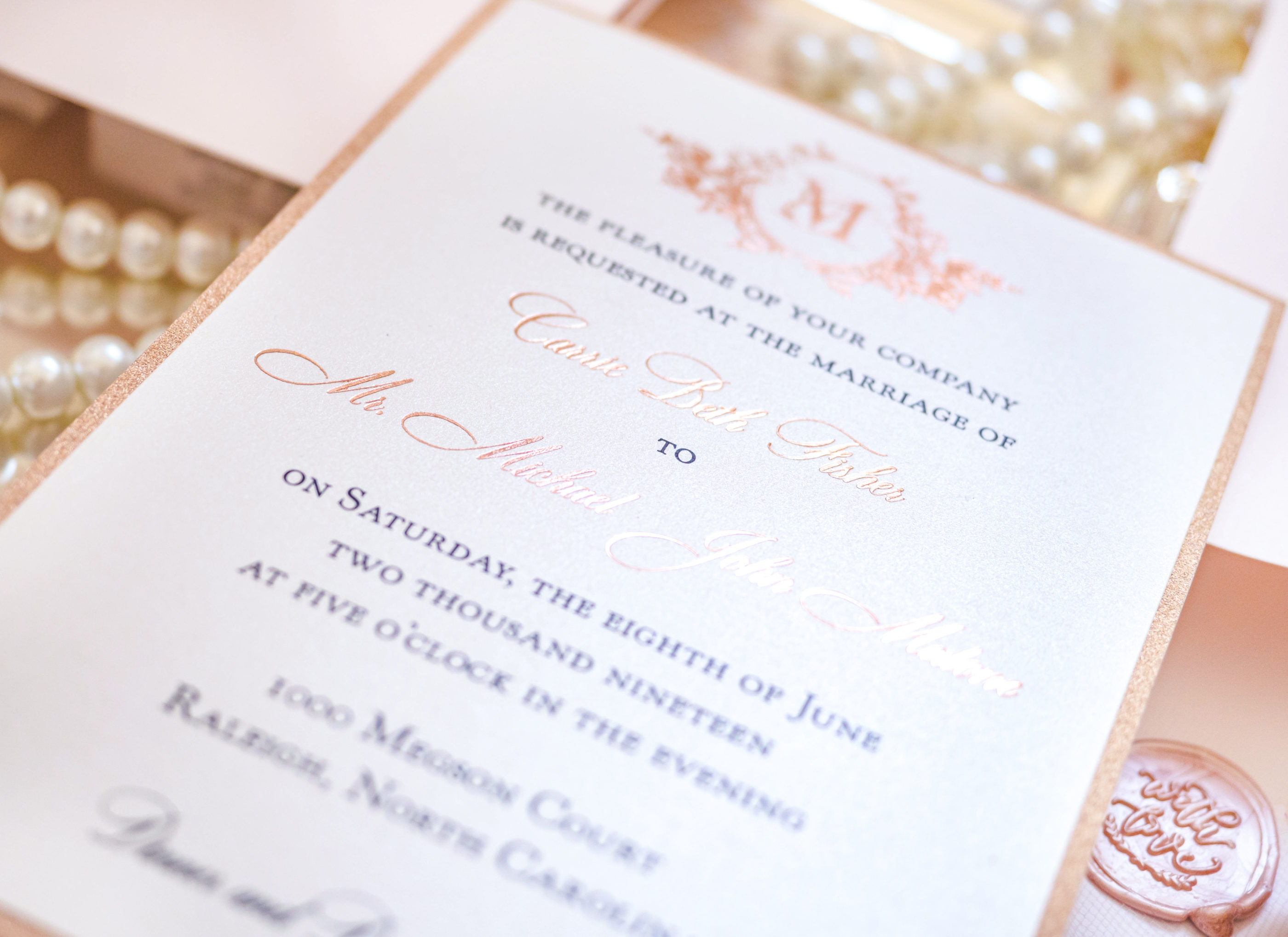 pink and embossed rose gold foil invitation suite
